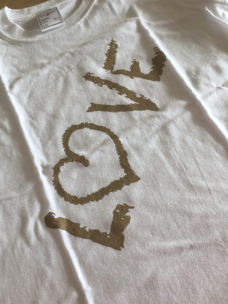 camisetas BLANCAS IMPRESION EN ORO